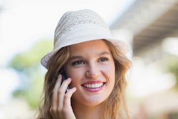 Pretty smiling woman on the phone