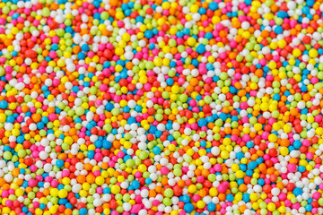 Fototapeta na wymiar Macro pattern colorful sugar for background