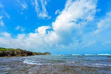 White clouds and a reef, Okinawa, Japan