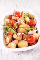 baked potato and tomato