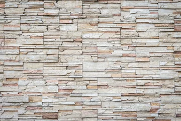 Foto op Plexiglas Steen Patroon van travertijn natuursteen muur textuur en achtergrond