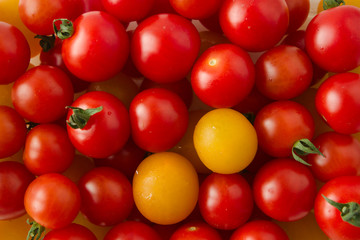 Delicious fresh, vegan, red and yellow ripe cherry tomatoes.