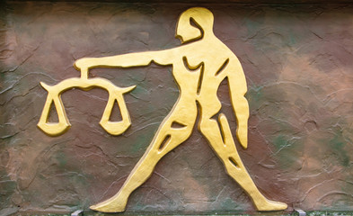 Libra sign of horoscope on the wall