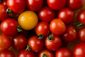 Delicious fresh, vegan, red and yellow ripe cherry tomatoes.