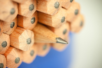 Macro image of graphite tip of a sharp ordinary wooden pencil as drawing and drafting tool,...