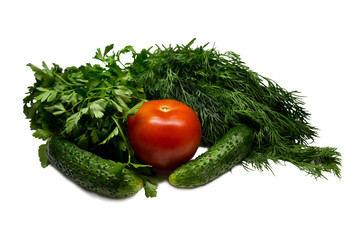 tomatoes, cucumbers and greens on a white background isolation