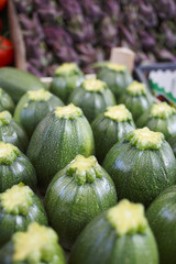 Fresh green zucchini/Ripe, organic green vegetables at the market.
