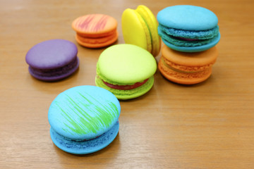 Colorful Macaron on wood background.