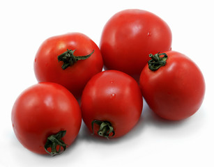 Few red tomatoes isolated on white