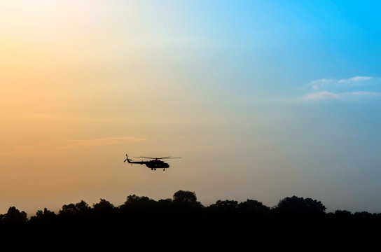 Helicopter at sunset