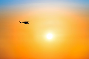 Helicopter flying in the beautiful sky