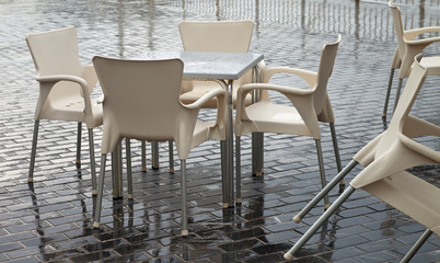 Closed cafe in rain time.