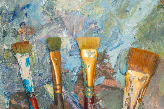 Paints brushes and oil paints