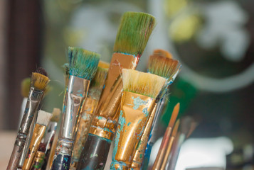 Paints brushes and oil paints