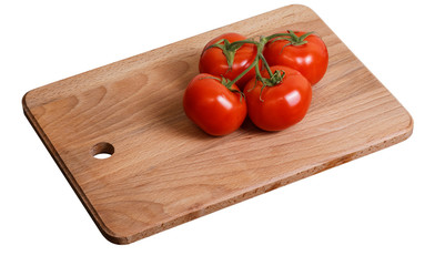 Branch of tomatoes on the kitchen cutting board