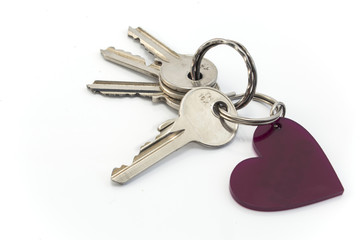 Keys and heart isolated on white