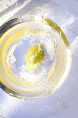 Falling lemon into water
