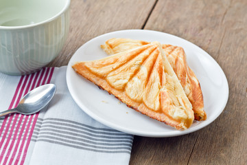 Tuna puff. Tuna sandwich on wood table.