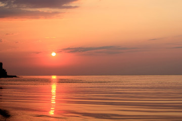 sunrise over the sea  and the beach