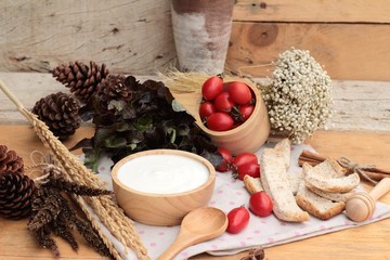 White yogurt and fresh cherry tomatoes