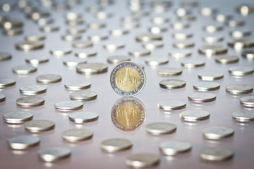 Thai Baht Coin among a heap of coins