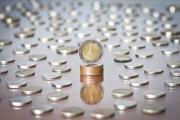 Thai Baht Coin among a heap of coins