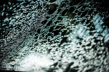 Damaged glass (car windshield) inside car