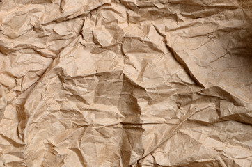 sheet of crumpled wrapping paper yellow
