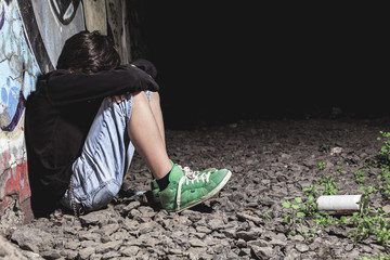 A sad teen depress at a tunnel