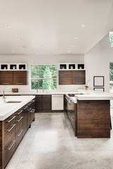 Beautiful Kitchen in Luxury Home with Island and Stainless Steel