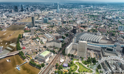Buildings of London along Thames river as seen from helicopter - obrazy, fototapety, plakaty