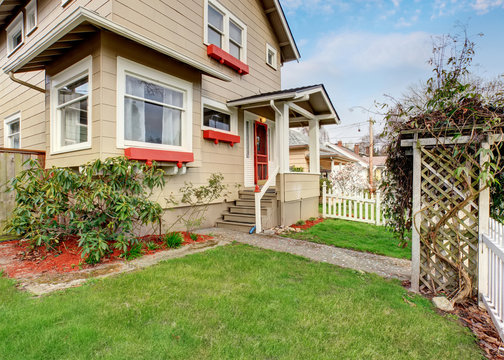 Perfect Vintage Home With White Fence.