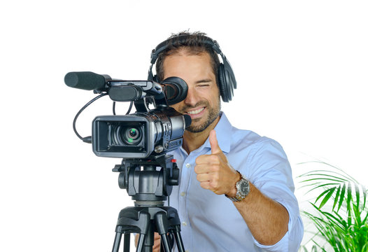 Young man with professional movie camera