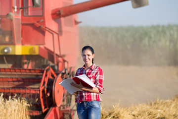 Woman agronomist in wheat field
