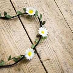 Obraz premium wreath on the head of artificial flowers