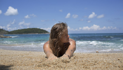 Fototapeta na wymiar Woman on a beach