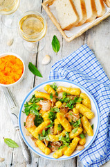 potatoes pumpkin gnocchi with bacon, cilantro and mint