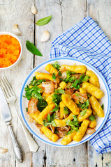 potatoes pumpkin gnocchi with bacon, cilantro and mint