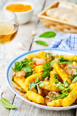 potatoes pumpkin gnocchi with bacon, cilantro and mint