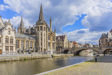 View of picturesque houses along channel in Ghent. Belgium.