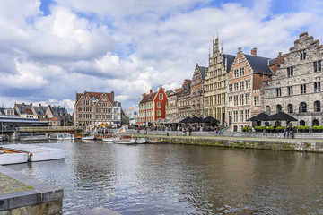Naklejka premium View of picturesque houses along channel in Ghent. Belgium.