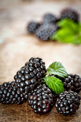 Blackberries on wooden background