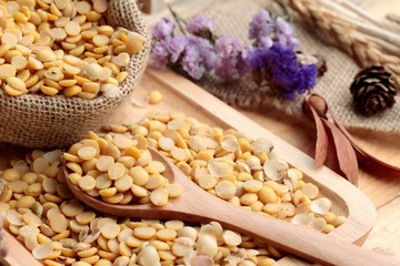 Soya beans on wood background