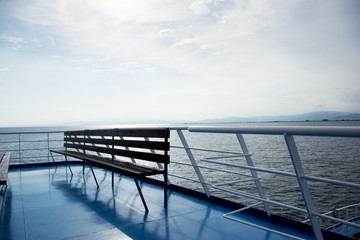 Wooden bench on a ferry boat