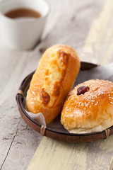 Freshly baked homemade bread in a bamboo basket, Selective focus