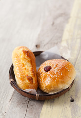 Freshly baked homemade bread in a bamboo basket, Selective focus