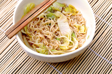 bowl of noodle with cabbage