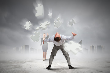 Man evading flying puzzle 