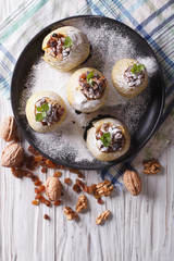 Rustic baked apples with raisin and honey vertical top view 
