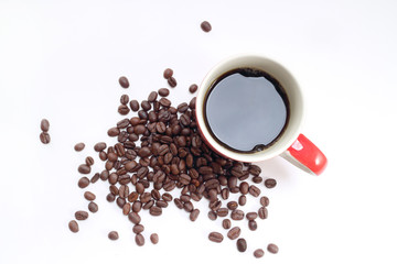 Coffee cup and beans on a white background.